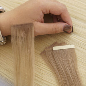 hur man installerar tejp i hårförlängningar