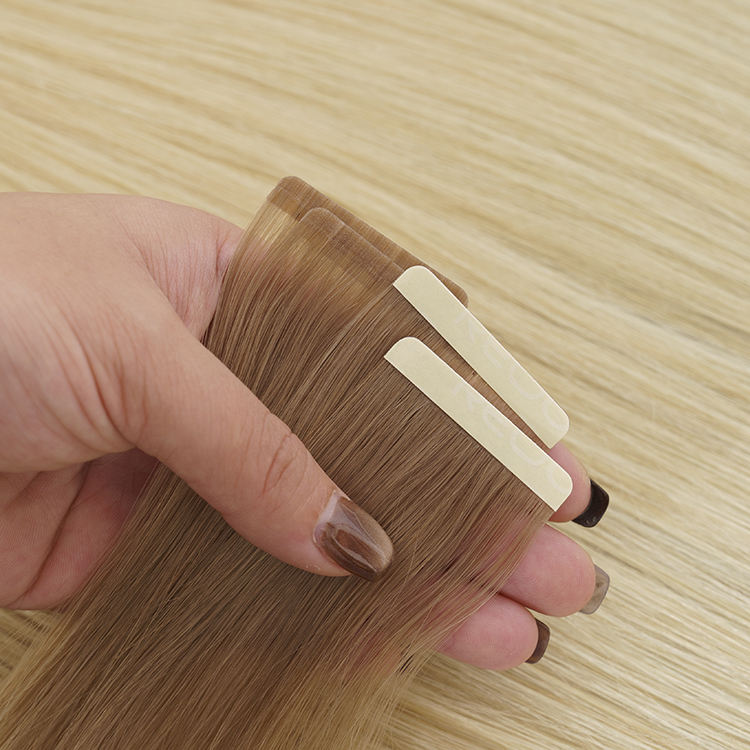 hur man installerar tejp i hårförlängningar